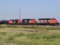 SD40-2(W)'s CN 5270, 5272 and 5261 are seen switching tank cars at the east end of CN's Scotford Yard.