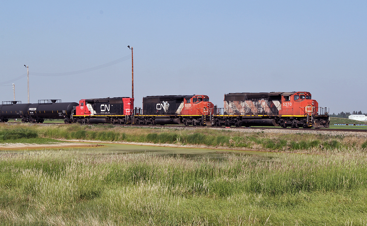 SD40-2(W)'s CN 5270, 5272 and 5261 are seen switching tank cars at the east end of CN's Scotford Yard.