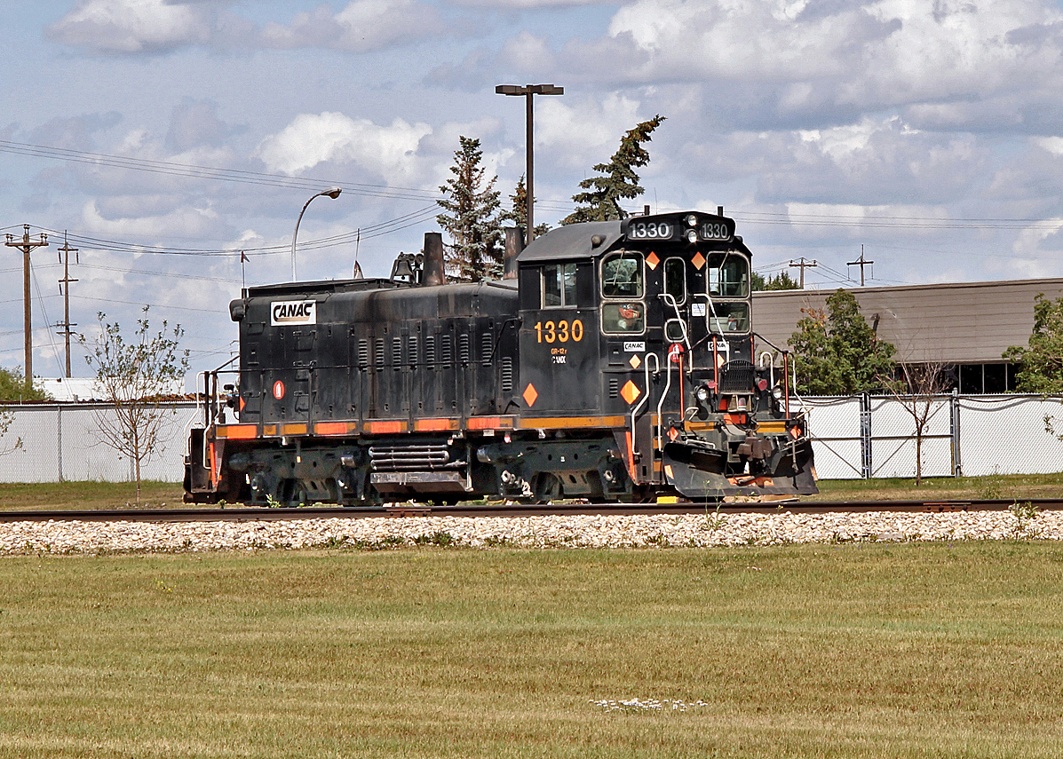 SW1200RS CANX 1330 (ex CN 1330) sits idle on the siding at Altasteel Works on 34st in Edmonton.
