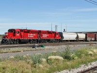 A pair of GP20C-ECO locomotives, CP 2246 and 2249 switch cars at the west end of CP's Alyth Yard in Calgary.