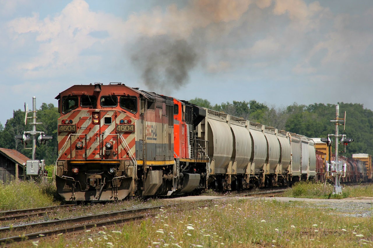 CN 331 struggles westward towards London after completing its work at Paris. As per other comments on here, CN 8014 was having trouble. The crew kept turning their headlights on and off.