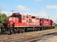 A pair of geeps race east towards Pender to start work at Toyota.