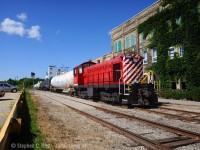 Impressive former Canadian Pacific 6593, restored and operating by the Waterloo Central Railway, is being 'borrowed' by GEXR as 584 switches two cars out, and two cars in for Chemtura in Elmira. A very rare daylight move, and with interesting power to boot. Due to the Region of Waterloo LRT construction, I am informed the line was essentially closed for the week due to culvert installation. Customer needed an emergency switch, and the Waterloo Central helped out with assistance from GEXR crew. Very nice to hear the McIntosh & Seymour designed 539T engine working hard - McIntosh & Seymour was purchased by ALCO in 1939 and formed the basis for ALCO's famous four cylinder designs going forward. <br><br>At right is the sprawling and equally neat Chemtura facility in Elmira.