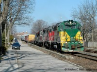 Ahh.. the start of my serious photography. Serious? Not really - but serious enough that I had purchased a Digital SLR a week or so prior - a Nikon D70 - at the time $3,000. I had shot film for about a year with my crappy 2 megapixel digital - the film was for my 'good' shots  - but the price of developing - and the pain in the butt of scanning and editing (which I had done this early in the game) made me quickly realize that a digital is cost effective by comparison. <br><br>
Even better, I lived just behind the house at right at 3 Glasgow St North, so I didn't have to go far to get this shot, This scene showing GEXR in its classic geep days - three, four, five, six... even as many as eight (!) four axle units could be found on 432/1 depending on tonnage and available engines. The four axle era ended approx 2006 when the purple/blue HLCX leasers arrived. <br><br>
The nickname for this engine, by local railfans at the time, was "John Deere". There were others.. who remembers "Barney" and "Tar Baby"??