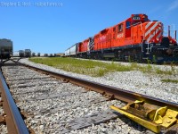 <b>Derail</b> marks the spot - "Massey Rd" is scrawled in the grime, as Ontario Southland Railway crew switches cars in the sprawling transload facility in Guelph.  To my surprise, both GP9's were out, a "Matched" pair of former CP Rail GP9's. Painted on the lead engine on the hoggers side is "Pulling for the City of Guelph".