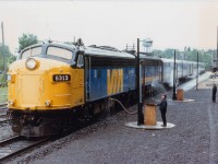 Toronto section of the Canadian, Northbound #9 is seen stopped at Parry Sound CP station for service. Let's be nice and neat about it, Lads. :o)  Second unit is 6631. The 6313 was sold to Ohio Central in 2002, same number, and then it went to Canadian Pacific as 4107 in 2006, after starting life as CN 6526, then to VIA 6526. So it has been around.