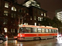 It was a rainy night downtown, and having just stepped off the streetcar onto College Street, it was fitting to grab a few night shots. TTC Canadian Light Rail Vehicle (CLRV) 4067 waits in traffic on a westbound 506 Dundas run, in front of the University of Toronto's Mining Building on College at McCaul.
<br><br>
Elevated to iconic status as "the" streetcars of Toronto for decades (since they started replacing the venerable PCC cars in the late 70's), Toronto's fleet of aging Hawker Siddeley/UTDC CLRV and ALRV streetcars are on the way out, as new modern low-floor articulated Bombardier streetcars start to arrive by flatcar from Thunder Bay. A few oldies have already been retired and scrapped, while the rest are being kept working as best as possible until supply chain issues with Bombardier's assembly plants are resolved.
<br><br>
Like all the H-series subway cars replaced over the last few years, the same saying holds true: get 'em while you can, because when they're gone, they're gone.