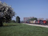 On our first group trips to Toronto in the late 70's we learned the good places to shoot from a couple of the best, Cleveland residents Al Clum and Dave McKay. One of their favorite spots is shown here at Scarborough Golf Course Rd on the east side of Toronto. This was mostly a passenger train route but occasionally there would be a freight, usually with auto parts taking a shortcut through downtown. 