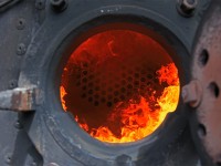 <b>In the Belly of the Dragon</b> the fire rages, maintaining the boiler pressure as we wait to depart on the third of the day's four runs.