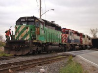 NREX 8092 (ex. BN 8092), HLCX 6206 (ex. BCOL 738) and SOO 6037 are about to lift 2 CP SD40-2's out of Walkerville Yard before heading east with a long train. These leasers are gone, but the SOO SD60 is still active in SOO colours as of Aug 2015.