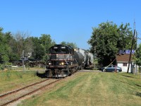 After waiting north of the diamond for CN 145 to pass, the biweekly OBRY freight train continues south through Brampton and on towards Streetsville where it will interchange traffic with CP.