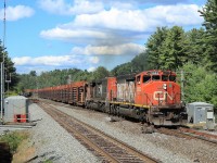 A couple of SD40-2Ws bring this train composed of CWR and crude oil through CN Boyne.