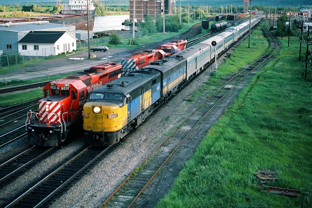 Colour.


Per Steve H.'s image comment

       
         see:    comment on colour  


Unexpected.


That is what I would describe the new ( in 1976 )  VIA RAIL  colours.


And Turbo, looked great in yellow with blue stripe.


           on the curve   


That VIA shade of blue made a great accent  ( secondary ) colour to the yellow on the  Turbo 


           on the grade   


Looked great in b & w too.

br>
           at Cherry Street Tower   


Turbo, the first new VIA scheme applied to a whole VIA train, did not prepare anyone for the unexpected reversal of the Turbo's  colours.


So, at one point in time I  wondered:  “ did a Swedish Prince take control at VIA? “


And while that shade of VIA blue is now mostly history, unfortunately the classic equipment that VIA blue was applied to is…..well.....


And for colourful livery  ? See this:


      VIA colours  at their ( autumn ) peak   


Here is my choice for :


           the  best use of  blue    


With a yellow accent at that !


ah, maybe it was just the equipment...less I digress....


So what you see here is colour and a good contrast of that too...


And my 1985 surprise was  to see 6787 in Thunder Bay ! Made at least as far West as Winnipeg !


 ( by 1983 most of the ex CP Rail F's purchased by VIA were retired, hence during the summer season VIA was likely short power for the lengthly summer transcontinental consists).


Here, in 1985,  VIA 6787 leads VIA #2 ( the VIA version of  Canadian )  into the Thunder Bay depot. Note the green marker lamps on CP RAIL 6037 leading 5752 and 5900


June 20 1985  Kodachrome by S. Danko


postscript: 


Here is VIA 6787 doing what 6787 did best: 


      see:     at track speed    


VIA 6787 lives: as Napa Valley #72


and not to forget: 


   those Stripes !  ( with Turbo in the corner )   


sdfourty