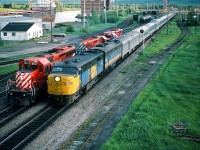 Colour.<br><br>Per Steve H.'s image comment<br><br>                see:  <a href="http://www.railpictures.ca/?attachment_id=20101">  comment on colour </a> <br><br>Unexpected.<br><br>That is what I would describe the new ( in 1976 )  VIA RAIL  colours.<br><br>And Turbo, looked great in yellow with blue stripe.<br><br>        <a href="http://www.railpictures.ca/?attachment_id=9629">   on the curve  </a> <br><br>That VIA shade of blue made a great accent  ( secondary ) colour to the yellow on the  Turbo <br><br>         <a href="http://www.railpictures.ca/?attachment_id=7447">  on the grade  </a> <br><br>Looked great in b & w too.<br>br>         <a href="http://www.railpictures.ca/?attachment_id=1825">  at Cherry Street Tower  </a> <br><br>Turbo, the first new VIA scheme applied to a whole VIA train, did not prepare anyone for the unexpected reversal of the Turbo's  colours.<br><br>So, at one point in time I  wondered:  “ did a Swedish Prince take control at VIA? “<br><br>And while that shade of VIA blue is now mostly history, unfortunately the classic equipment that VIA blue was applied to is…..well.....<br><br>And for colourful livery  ? See this:<br><br>   <a href="http://www.railpictures.ca/?attachment_id=8056">   VIA colours  at their ( autumn ) peak  </a> <br><br>Here is my choice for :<br><br>          <a href="http://www.railpictures.ca/?attachment_id=12195"> the  best use of  blue   </a> <br><br>With a yellow accent at that !<br><br>ah, maybe it was just the equipment...less I digress....<br><br>So what you see here is colour and a good contrast of that too...<br><br>And my 1985 surprise was  to see 6787 in Thunder Bay ! Made at least as far West as Winnipeg !<br><br> ( by 1983 most of the ex CP Rail F's purchased by VIA were retired, hence during the summer season VIA was likely short power for the lengthly summer transcontinental consists).<br><br>Here, in 1985,  VIA 6787 leads VIA #2 ( the VIA version of  Canadian )  into the Thunder Bay depot. Note the green marker lamps on CP RAIL 6037 leading 5752 and 5900<br><br>June 20 1985  Kodachrome by S. Danko<br><br>postscript: <br><br>Here is VIA 6787 doing what 6787 did best: <br><br>      see:  <a href="http://www.railpictures.ca/?attachment_id=8807">   at track speed   </a> <br><br>VIA 6787 lives: as Napa Valley #72<br><br>and not to forget: <br><br>  <a href="http://www.railpictures.ca/?attachment_id=6873"> those Stripes !  ( with Turbo in the corner )  </a> <br><br>sdfourty