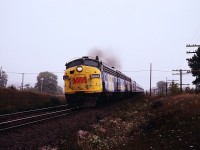 An A-B-A set of F units hauls 9 cars towards Toronto. One of my brothers photos. He used part of his student loan to by a Pentax K-1000. (priorities)