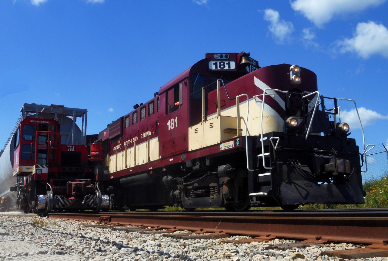 What's better, an MLW RS-18u, RS-23 smoking up the air, or the trackmobile at Traxxside Transfer? You decide in the comments section.