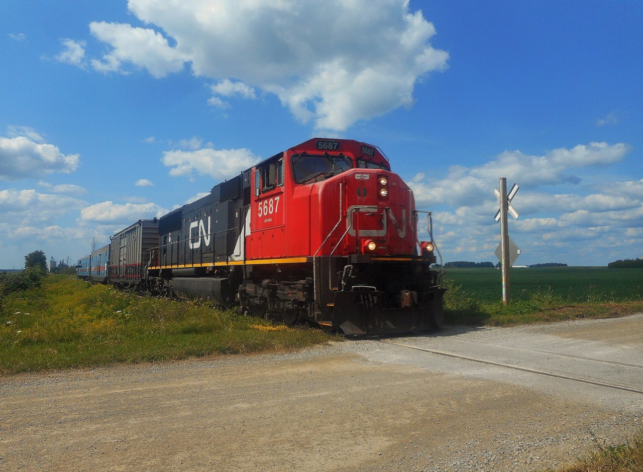 The CN TEST train made it's yearly run on the Goderich Exeter Railway recently. On the Guelph Sub. one day, and the Goderich Sub. the next. With my shot in Guelph not turning out, I headed towards Goderich. Headed south, the train is seen crossing Road 182 (Beechwood Line), just south of Seaforth. After reaching Stratford, the consist backed to London. The consist was CN SD75i 5687, test car 415867, engineering car 15007,and inspection car 15008. Thanks to Stephen Host for the heads up on this train.