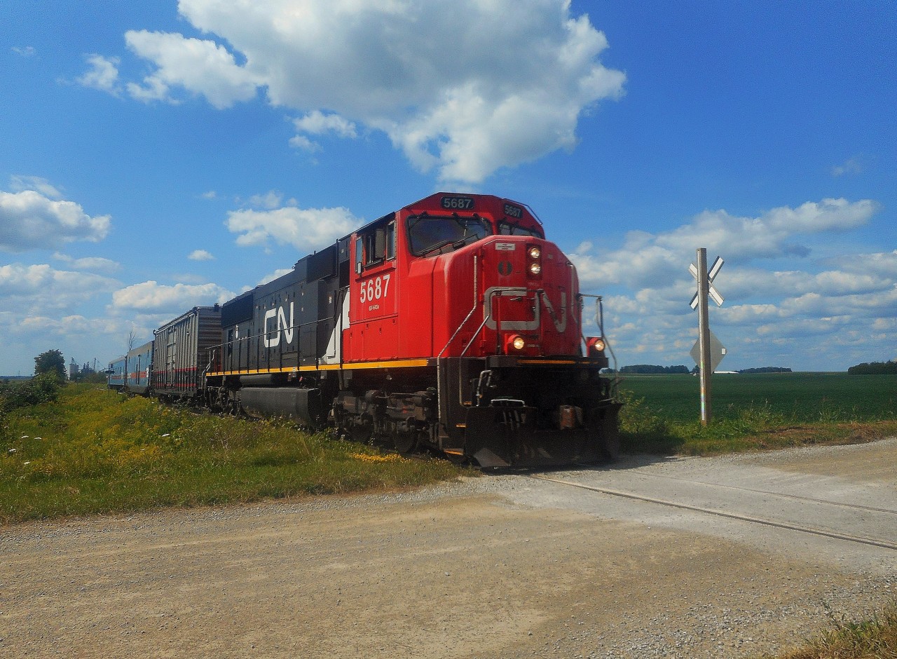 The CN TEST train made it's yearly run on the Goderich Exeter Railway recently. On the Guelph Sub. one day, and the Goderich Sub. the next. With my shot in Guelph not turning out, I headed towards Goderich. Headed south, the train is seen crossing Road 182 (Beechwood Line), just south of Seaforth. After reaching Stratford, the consist backed to London. The consist was CN SD75i 5687, test car 415867, engineering car 15007,and inspection car 15008. Thanks to Stephen Host for the heads up on this train.