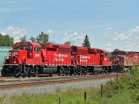 A pair of GP20c-ECO units, CP 2235 ansd 2327 sit in CP's Scotford Yard.  Behind are ES44AC 8808 and AC4400CW 9774 which will be the road power heading south to Calgary and on to Coutts when a full train is built.