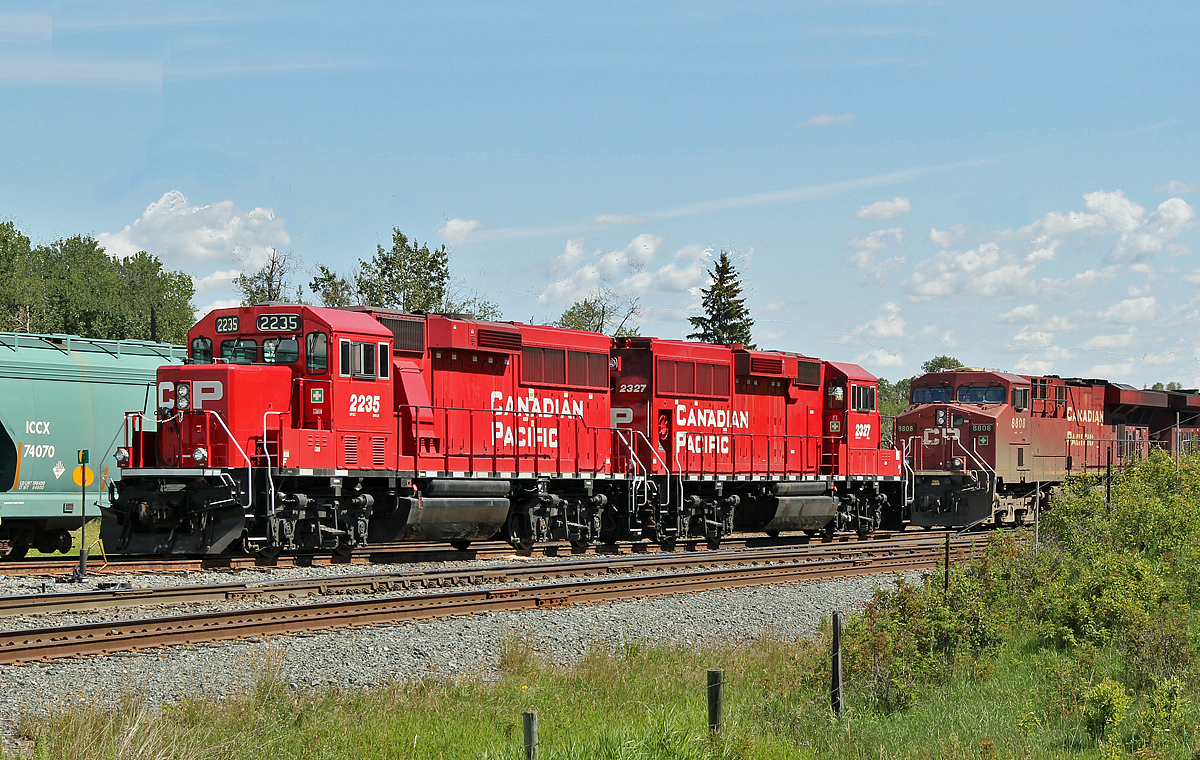 A pair of GP20c-ECO units, CP 2235 ansd 2327 sit in CP's Scotford Yard.  Behind are ES44AC 8808 and AC4400CW 9774 which will be the road power heading south to Calgary and on to Coutts when a full train is built.