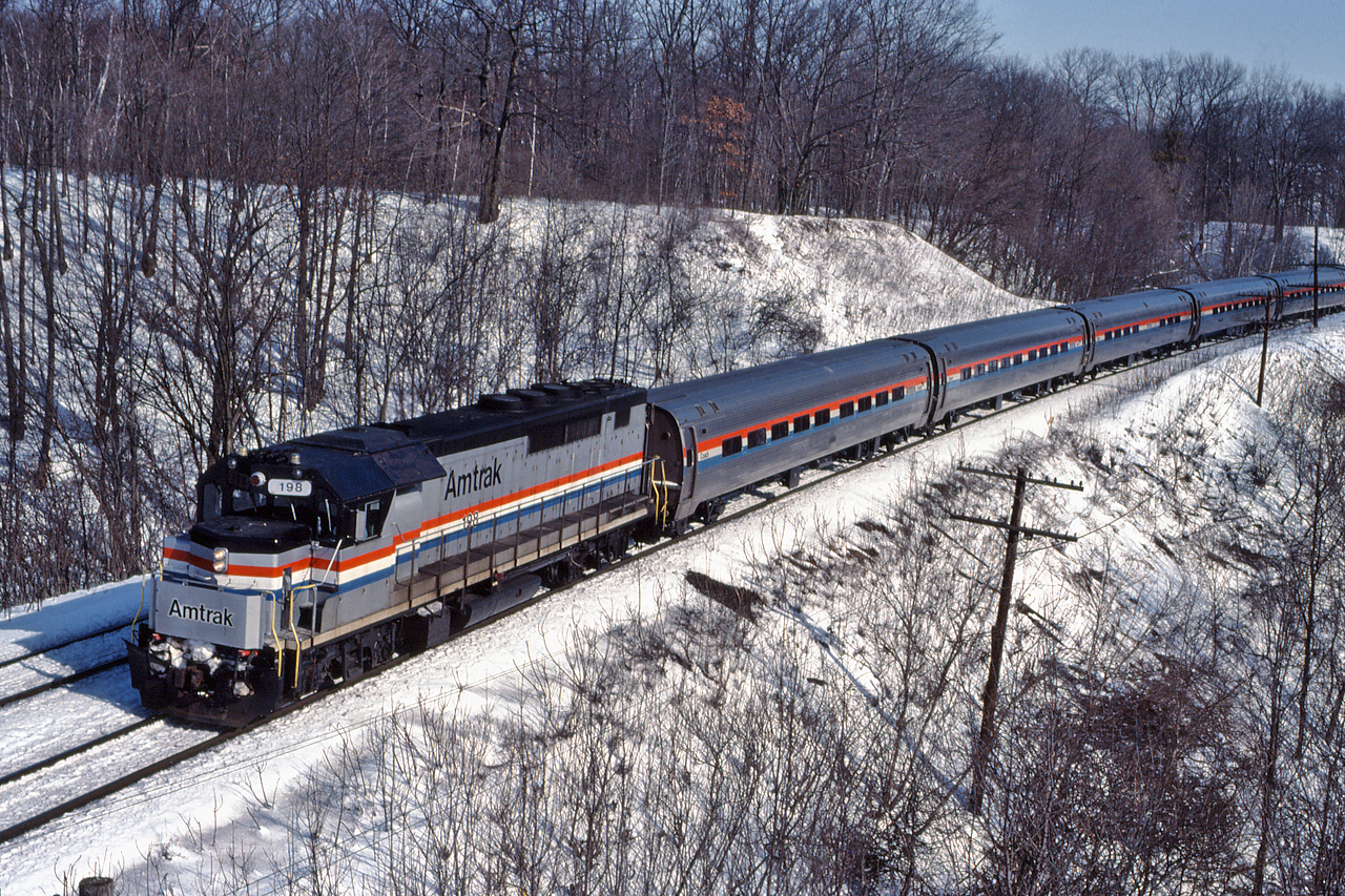 Ex-GO Transit GP40TC, now owned by Amtrak leads the Maple Leaf through Bayview on a chilly February morning in 1993.