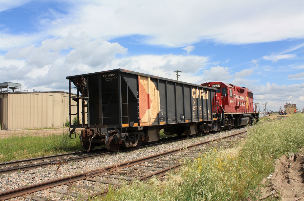 CP Locomotive 3056 war sitting on the main line in Lloydminster AB about a block or so away from the CP yard office in Lloydminster Sask. In this picture you can see the CP Lloydminster Sask.yard office in the background. Great spot for taking photographs! Except in the winter months.