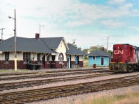 Cape Tormentine, the mainland connection to the Prince Edward Island railroad back when there was rail traffic to and from the Island, is now devoid of all trackage, and I'd like to know if the station itself still exists, as it was an impressive structure. Anyone know?
This view from the late 1970s shows CN 3632, an MLW RS-18, now off the roster more than 20 years, as the sole unit in charge of handling ferry traffic to and from the Island connection at Borden. The rail traffic had dwindled considerably by this time, and by the end of the 1980s it was all over. The Tormentine sub used to connect with the current CN mainline at Sackville, the east coast connection to Halifax.