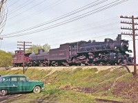 A few things strike me as interesting in this image...
<br />
<br />
The automobile is a 1955 Chevrolet Model 150 (six cylinder)...
<br />
<br />
There was no shortage of power lines back in 1958...
<br />
<br />
Del's state-of-the-art Nikon camera was no match for a speeding Pacific-type locomotive.  I'm guessing that he was frustrated by his inability to split a second into a thousand tiny pieces.