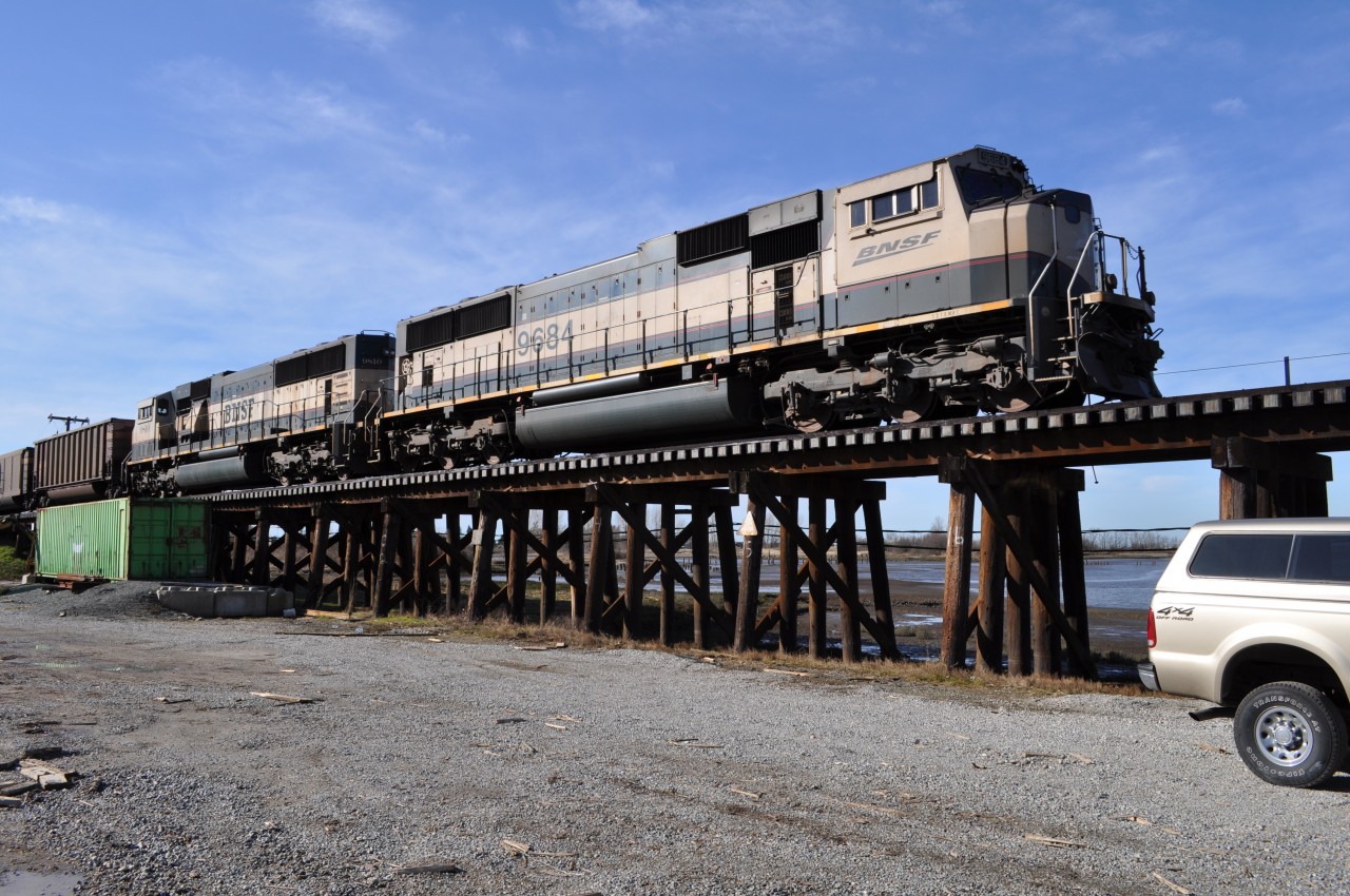 Two pushers heading South over Mud Bay returning from the Roberts Bank coal port