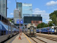 <b>Lots of Bombardier cars.</b> It's the start of the afternoon rush hour at Lucien L'Allier station in Montreal. At left is AMT 185 for Saint-Jérôme, AMT 19 for Vaudreuil and at right is AMT 87 for Candiac. All are equipped with Bombardier cars.
