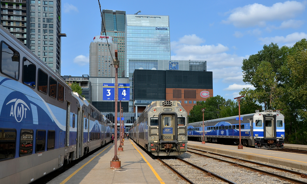 Lots of Bombardier cars. It's the start of the afternoon rush hour at Lucien L'Allier station in Montreal. At left is AMT 185 for Saint-Jérôme, AMT 19 for Vaudreuil and at right is AMT 87 for Candiac. All are equipped with Bombardier cars.