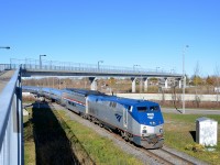 The southbound Adirondack out of Montreal has just left Southwark Yard and has entered the Rouses Point Sub, on the first leg of its journey towards New York City. The Great Dome car is behind the power.
