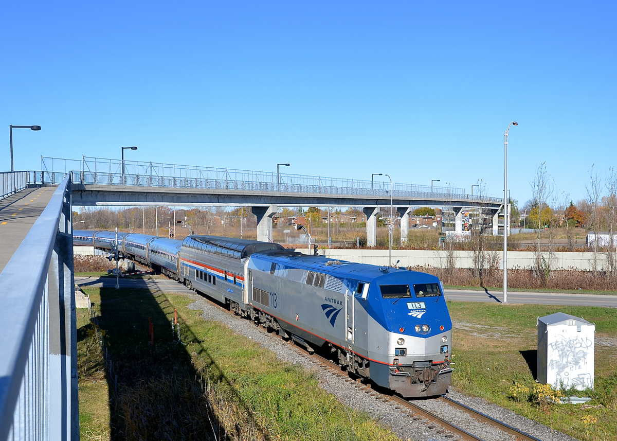 The southbound Adirondack out of Montreal has just left Southwark Yard and has entered the Rouses Point Sub, on the first leg of its journey towards New York City. The Great Dome car is behind the power.