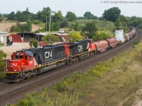 CN M33131-31 leans into the curve at Garden Ave with CN 5466 leading the charge.  Having standard cab leaders on my last two CN trains has been nice!