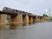 <b>More power than usual.</b> CN 327 has three CSXT units and one CN unit as it crosses over the Ottawa River (CSXT 219, CSXT 5381, CN 2025 & CSXT 4684).