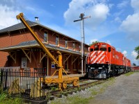 <b>In front of Hays Station.</b> A Napierville Junction Railway MoW piece of equipment and two CP Century locomotives (M630 CP 4563 & C424 CP 4237) are seen in front of Hays Station at Exporail.
