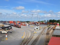 CP 112 at left is entering Lachine IMS yard with CP 8780 at the head end as CP 119 at far right leaves after doing a lift.