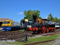 <b>Built only 13 years apart.</b> While VIA 6921 at left and the 'John Molson' steam engine at right are from different era's of railroading, they were only built 13 years apart. VIA 6921 was built by Bombardier in 1983 and the 'John Molson' was built by Kawasaki as a replica of an 1840's-era Canadian steam engine.