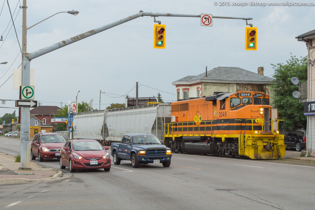 RLHH 3049 eases up to the intersection of Clarence and Colborne in Brantford with two hoppers for the Ingenia plant at the end of the Burford Spur.  RLHH 496 was running at the perfect time for me to grab a few shots before getting over to the office before 0800, definitely a good way to start the day!