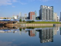 <b>A 100% Bombardier consist reflected</b> AMT 809 with Bombardier ALP-45DP AMT 1350 pushing five Bombardier multilevel cars is reflected in the Peel Basin in Montreal on a very hot morning.