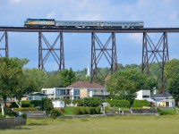<b>Rare mileage on an ex-transcontinental main line.</b> A VIA special train is crossing the famous Cap-Rouge Trestle near Quebec City on what was once part of the National Transcontinental Railway (now part of CN). This is no longer a through route and does not normally see any VIA Rail service. Multiple trains were run from Joffre yard to this trestle and back for CN Family Day.