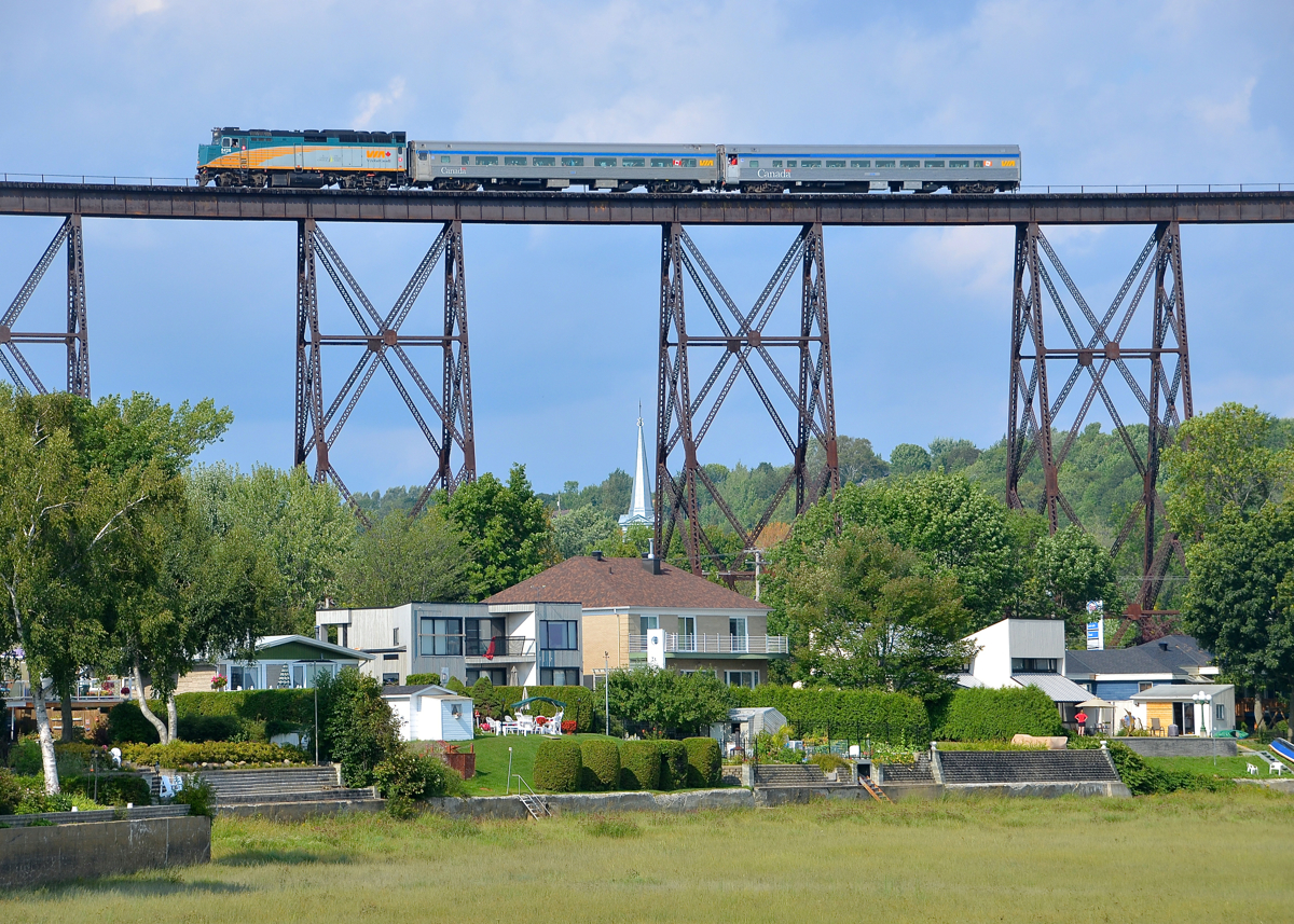 Rare mileage on an ex-transcontinental main line. A VIA special train is crossing the famous Cap-Rouge Trestle near Quebec City on what was once part of the National Transcontinental Railway (now part of CN). This is no longer a through route and does not normally see any VIA Rail service. Multiple trains were run from Joffre yard to this trestle and back for CN Family Day.