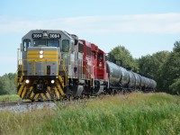 CP 3084 (GP38-2) and CP 2323 (GP20C-ECO) lead an outbound train of 10 empty tank cars (marked Liquified Petroleum Gas) on the Hoadley Sub. The only customer on this subdivision is the Rimbey Gas Plant.