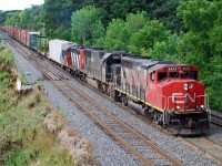 Mr. Host's encouragement to submit older photos sparked me to look back through some earlier digital photos and I found this photo taken exactly six years ago to the day.  422 coming out of Hamilton with CN 9574, IC 1017, and CN 4135. CN GP40-2Ws were some common when I was kid we called them "regulars" as many trains had three of them for power... now I'm trying to think when the last time I saw one was.  It's been a while!  Thanks for the suggestion Steve, I look forward to see what others submit. 