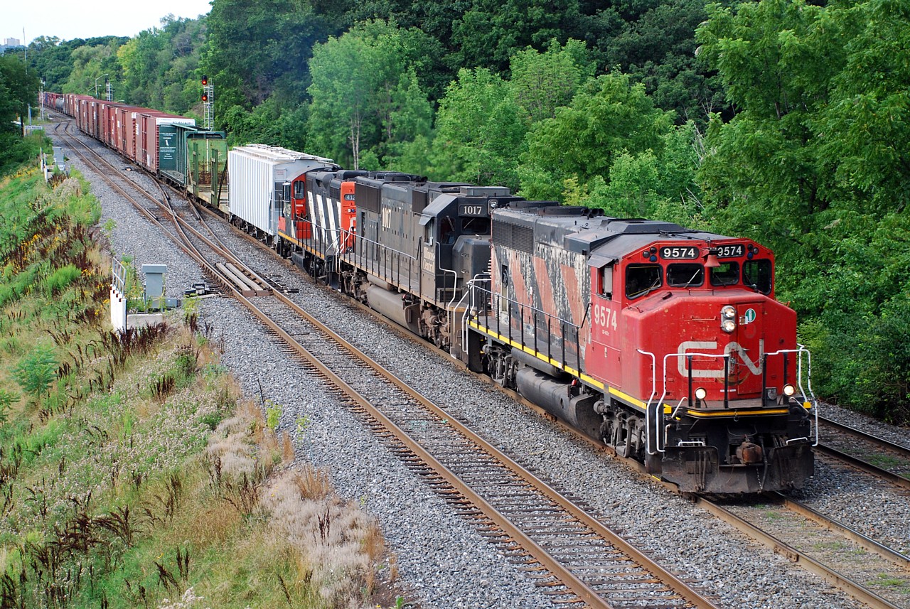 Mr. Host's encouragement to submit older photos sparked me to look back through some earlier digital photos and I found this photo taken exactly six years ago to the day.  422 coming out of Hamilton with CN 9574, IC 1017, and CN 4135. CN GP40-2Ws were some common when I was kid we called them "regulars" as many trains had three of them for power... now I'm trying to think when the last time I saw one was.  It's been a while!  Thanks for the suggestion Steve, I look forward to see what others submit.