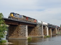 On its way to Massena, Syracuse and ultimately Selkirk, NY CN 327 crosses the Ottawa River on the Ste-Annes Bridge after departing Montreal.
