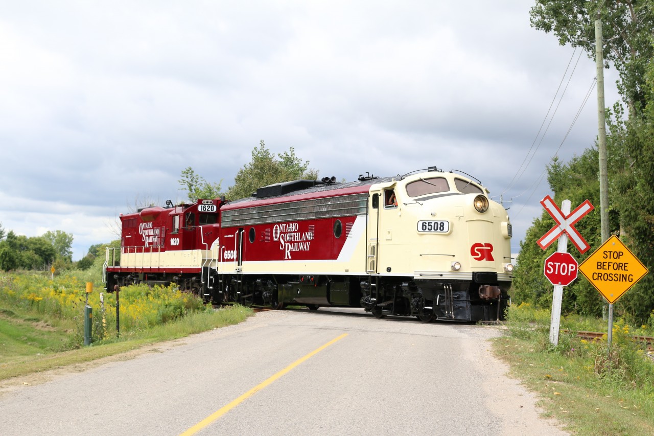 OSR 6508 is on its maiden run, backing to the potash facility in Putnum with former CP GP9U 1620 as the sun briefly makes an appearance. This day both OSR jobs would be assigned "F" units.