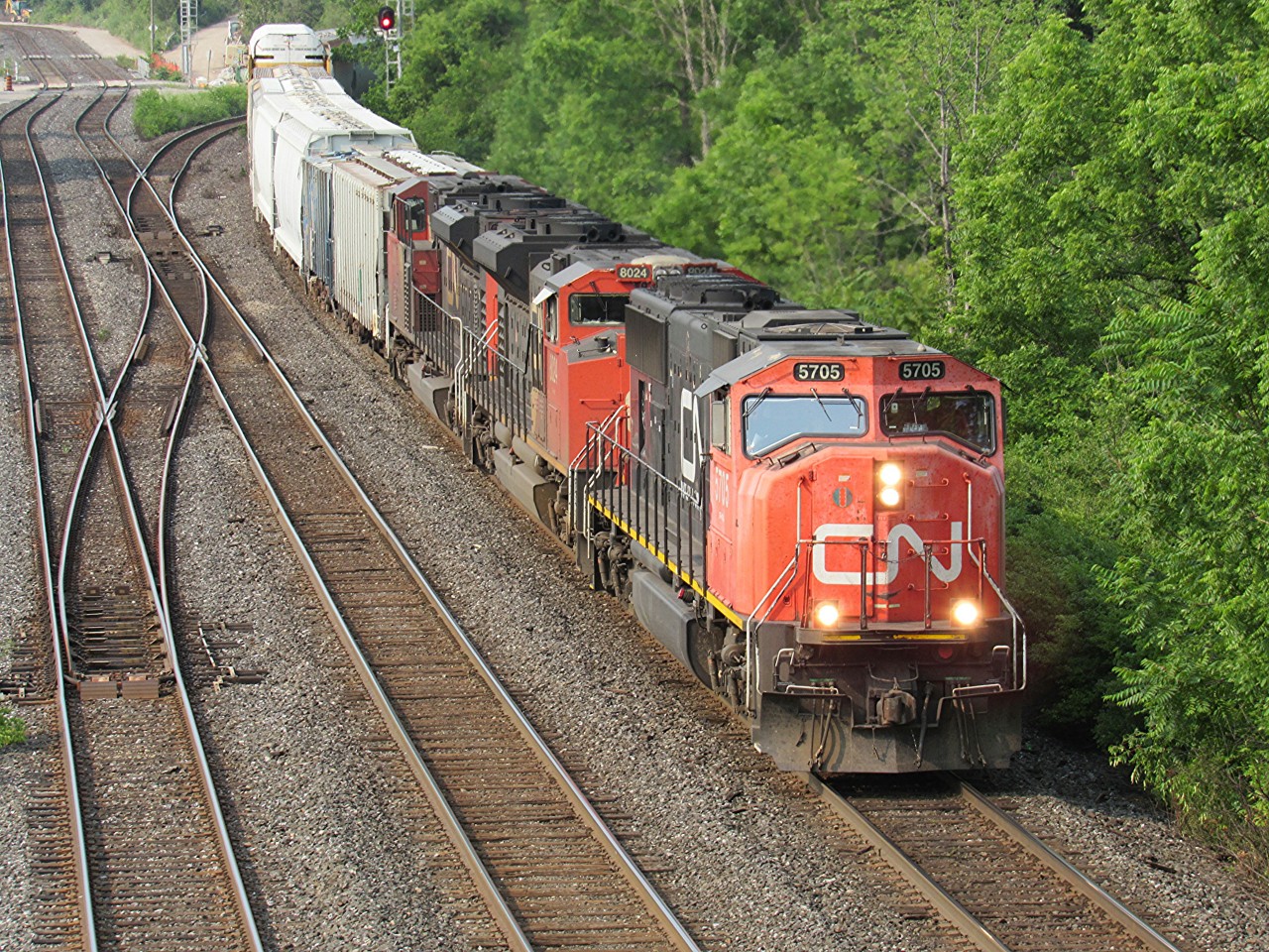 As the morning rush of rail traffic at Bayview Junction on the CN Oakville Subdivision is soon coming to an end for the day, CN M398 makes it's way off the Dundas Subdivision, onto the Oakville Subdivision, prepared to crossover to the Halton Subdivision.
