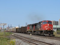 Canadian National eastbound mixed freight, M384, is a little late this morning. Usually arriving in London around the 7 to 10 AM time, this was nearing the lunch hour. During the 13th of August, most eastbound CN freights were quite late. Not exactly sure why, but it happens here and there. 