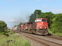 I was on my way to London, Ontario for a day of railfanning, when I heard about CN M384 heading east, with a nice lash up. So I decided to get off the 401, and catch 384 in one of my favourite spots. That spot is Ingersoll, Ontario. I arrived and VIA 70 had just about beat me there. But 384 was still at CN Frauts, near London. The engine of interest, is EJE 666. An SD38-2. Even though it was in CN paint, it was still a nice surprise. 
